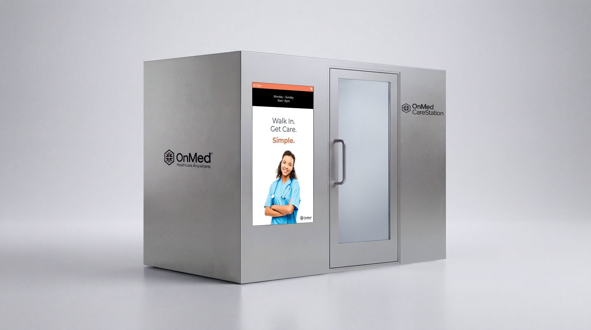 OnMed CareStation™ 2.0— a walk-in, onsite medical kiosk with a digital display and private entry door, delivering employer-sponsored healthcare on demand.
